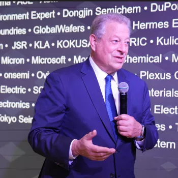 Al Gore speaking in front of SCC member names
